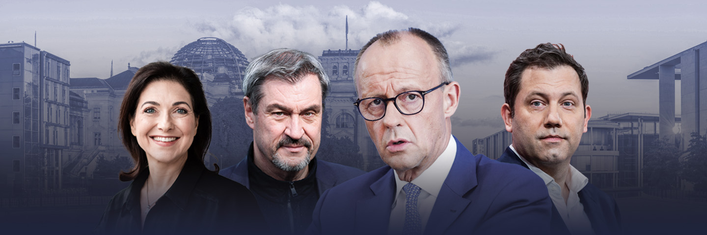 Vier Politiker vor dem Reichstagsgebäude